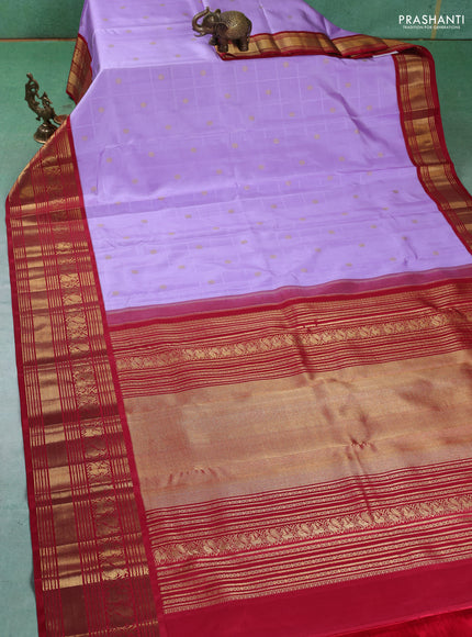 Pure kanchipuram silk saree lavender and maroon with allover self emboss & zari buttas and long rich zari woven korvai border