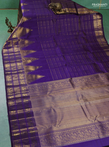 Pure kanchipuram silk saree violet with allover zari weaves and long temple design zari woven border