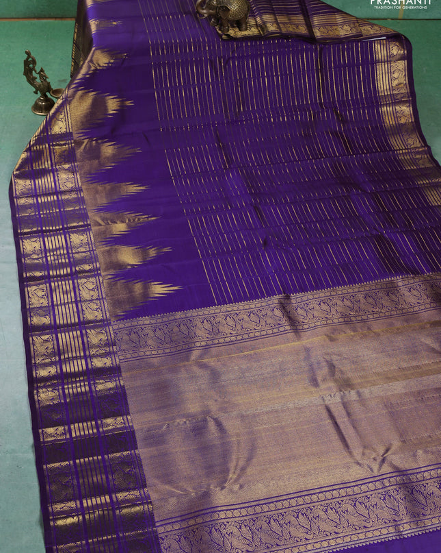 Pure kanchipuram silk saree violet with allover zari weaves and long temple design zari woven border