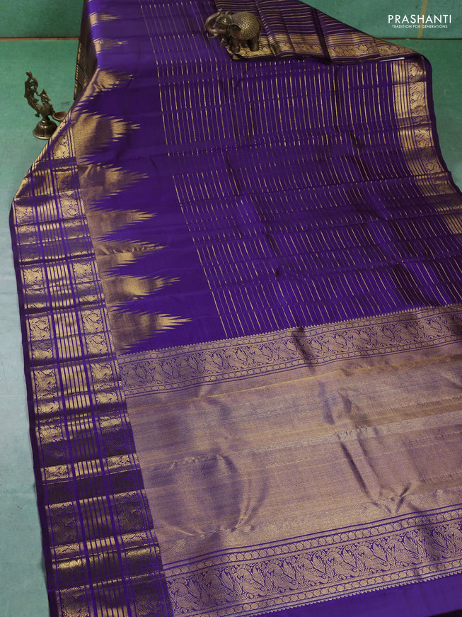 Pure kanchipuram silk saree violet with allover zari weaves and long temple design zari woven border