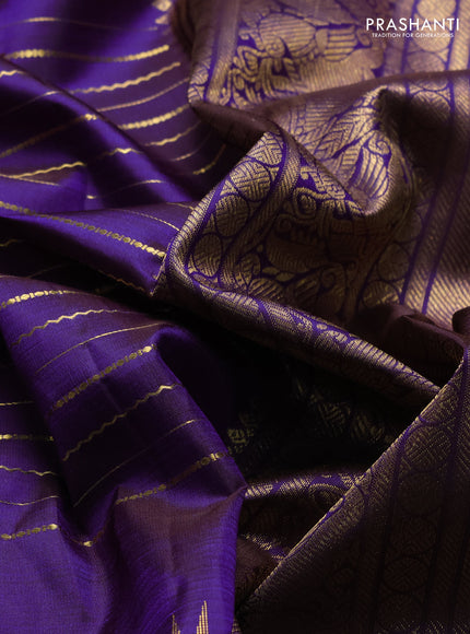 Pure kanchipuram silk saree violet with allover zari weaves and long temple design zari woven border