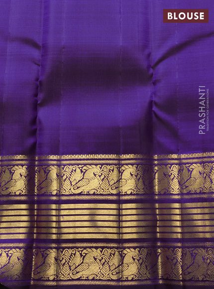 Pure kanchipuram silk saree violet with allover zari weaves and long temple design zari woven border