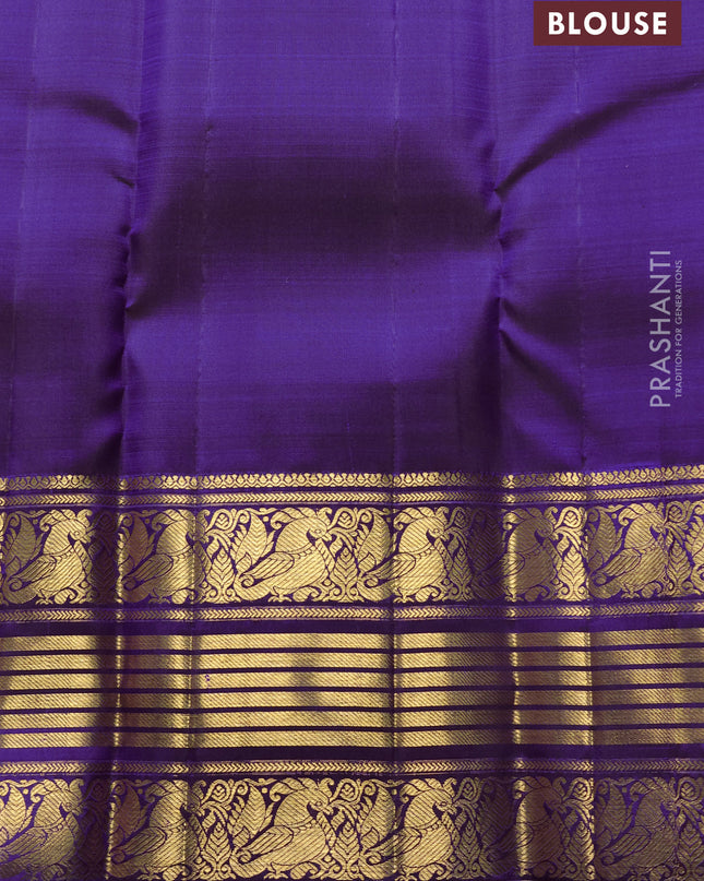 Pure kanchipuram silk saree violet with allover zari weaves and long temple design zari woven border