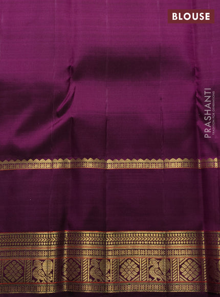 Pure kanchipuram silk saree cream and purple with zari woven buttas and long rich zari woven korvai border