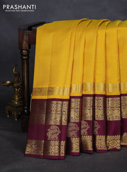 Pure kanchipuram silk saree yellow and wine shade with allover vairaosi pattern and long rich zari woven korvai border
