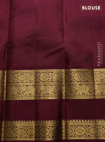 Pure kanchipuram silk saree yellow and wine shade with allover vairaosi pattern and long rich zari woven korvai border