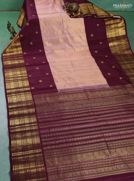 Pure kanchipuram tissue silk saree mild peach and wine shade with plain body and long zari woven korvai border