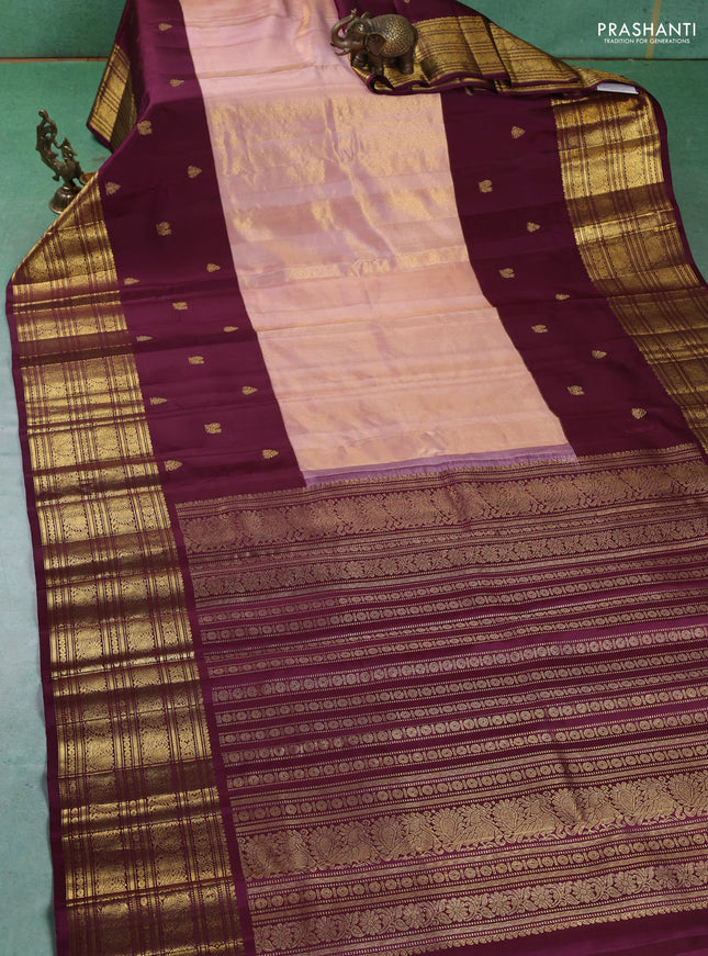 Pure kanchipuram tissue silk saree mild peach and wine shade with plain body and long zari woven korvai border