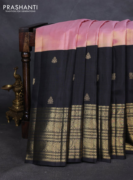 Pure kanchipuram tissue silk saree mild peach pink and black with plain body and long zari woven korvai border