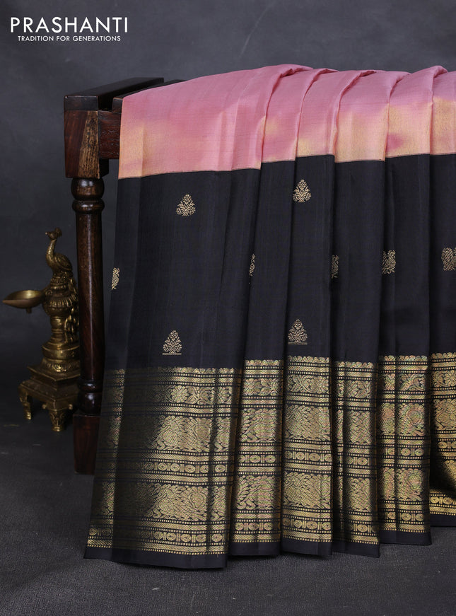 Pure kanchipuram tissue silk saree mild peach pink and black with plain body and long zari woven korvai border