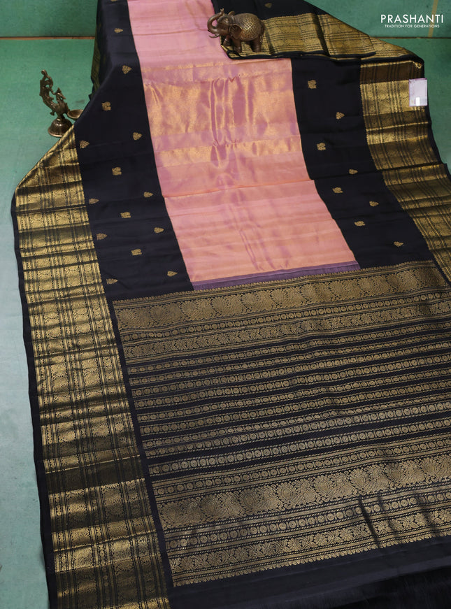 Pure kanchipuram tissue silk saree mild peach pink and black with plain body and long zari woven korvai border