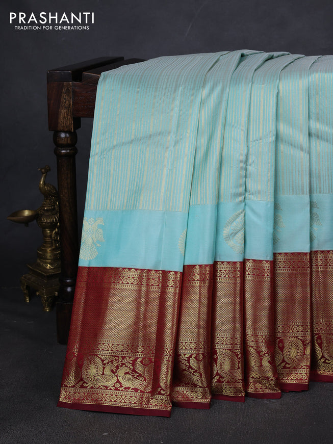 Pure kanchipuram silk saree teal blue and maroon with allover zari weaves and rich zari woven border