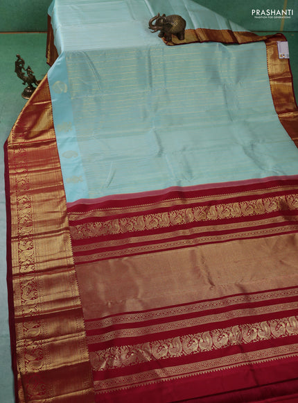 Pure kanchipuram silk saree teal blue and maroon with allover zari weaves and rich zari woven border