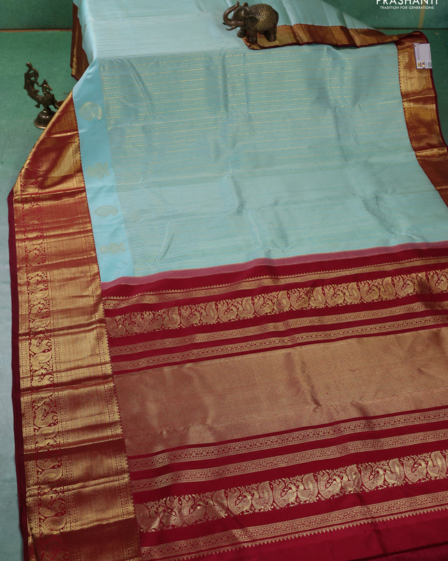Pure kanchipuram silk saree teal blue and maroon with allover zari weaves and rich zari woven border