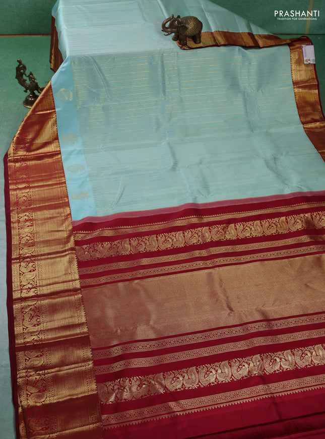 Pure kanchipuram silk saree teal blue and maroon with allover zari weaves and rich zari woven border