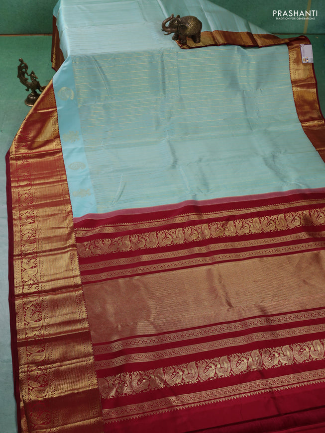 Pure kanchipuram silk saree teal blue and maroon with allover zari weaves and rich zari woven border