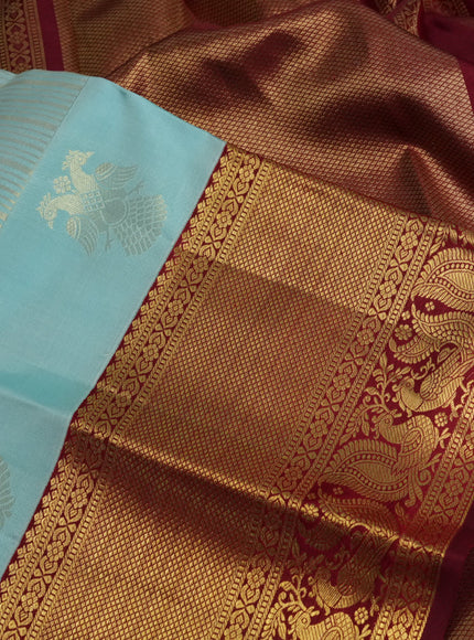 Pure kanchipuram silk saree teal blue and maroon with allover zari weaves and rich zari woven border