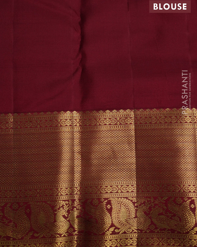 Pure kanchipuram silk saree teal blue and maroon with allover zari weaves and rich zari woven border