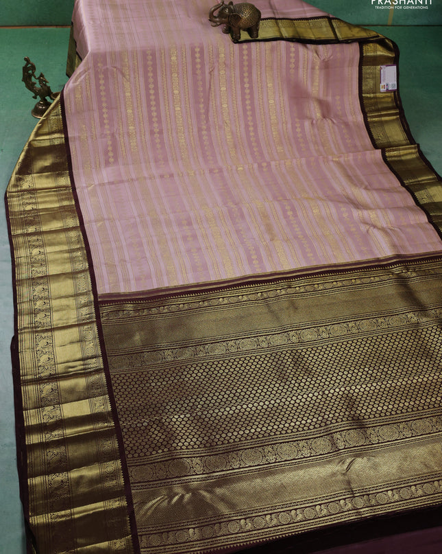 Pure kanchipuram silk saree pastel pink and coffee brown with allover self emboss and zari woven korvai border