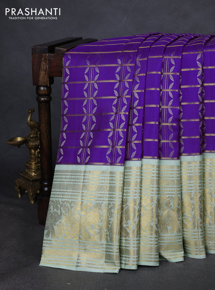 Pure kanchipuram silk saree violet and pastel green with allover zari checks & silver zari weaves and long zari woven korvai border