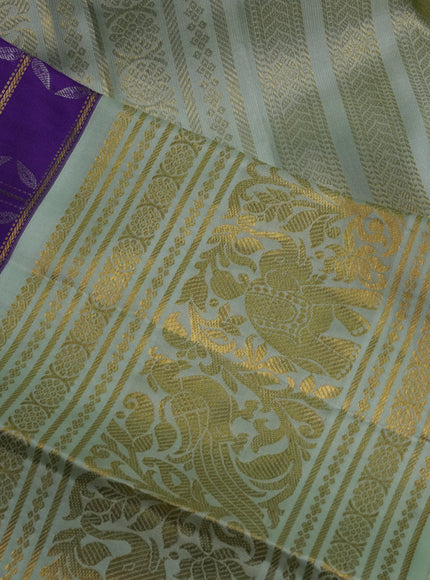Pure kanchipuram silk saree violet and pastel green with allover zari checks & silver zari weaves and long zari woven korvai border