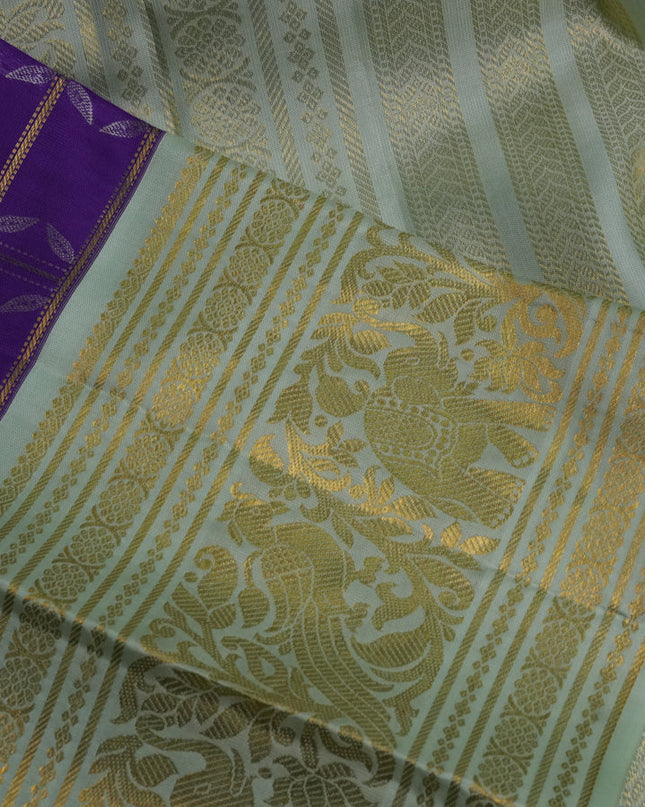 Pure kanchipuram silk saree violet and pastel green with allover zari checks & silver zari weaves and long zari woven korvai border
