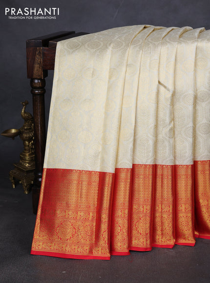Pure kanchipuram silk saree cream and red with allover zari woven butta weaves and zari woven border