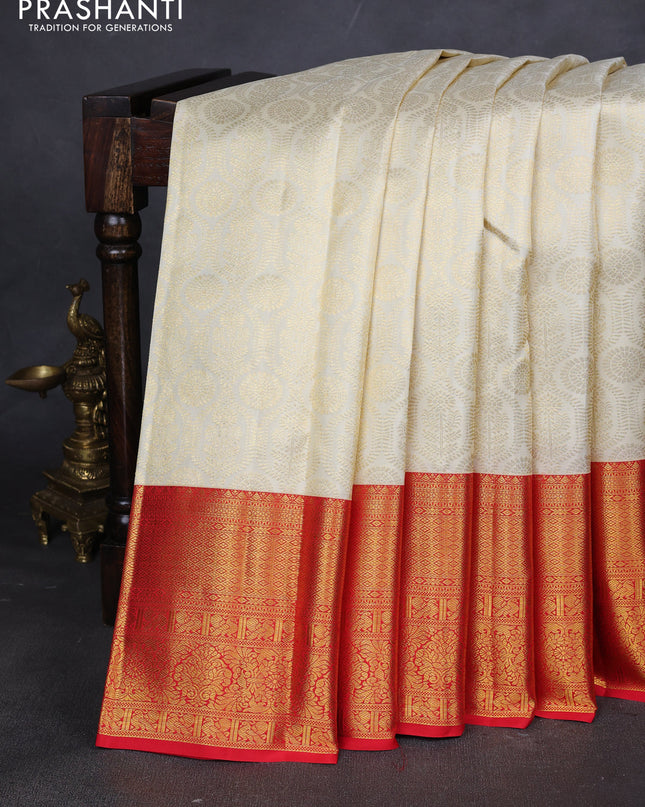 Pure kanchipuram silk saree cream and red with allover zari woven butta weaves and zari woven border