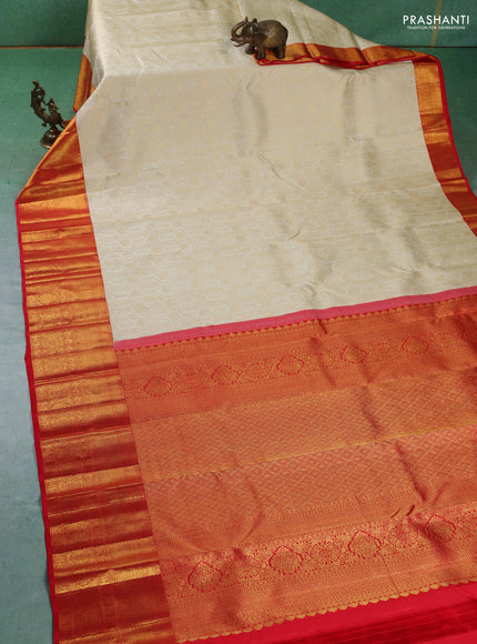 Pure kanchipuram silk saree cream and red with allover zari woven butta weaves and zari woven border