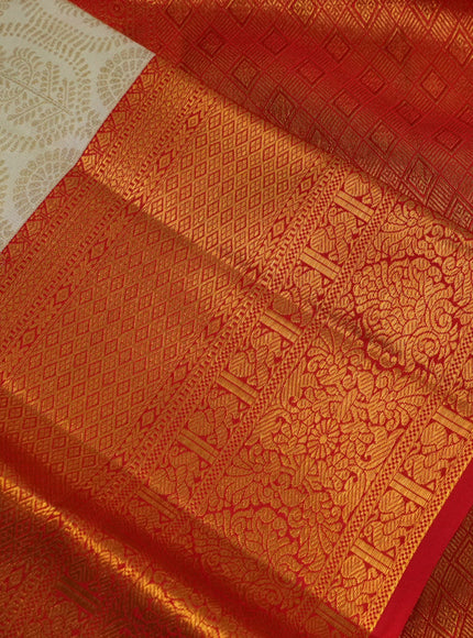 Pure kanchipuram silk saree cream and red with allover zari woven butta weaves and zari woven border