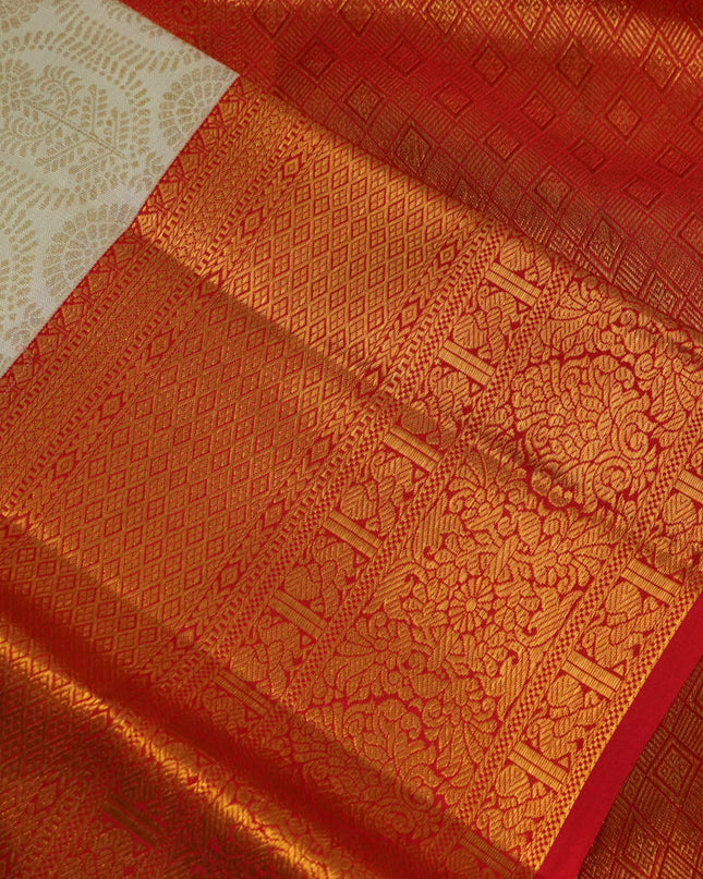 Pure kanchipuram silk saree cream and red with allover zari woven butta weaves and zari woven border