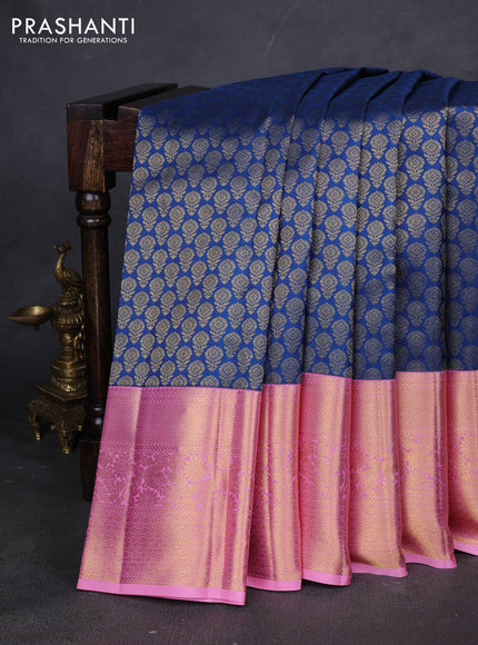 Pure kanchipuram silk saree peacock blue and peach pink with allover zari woven butta weaves and zari woven border