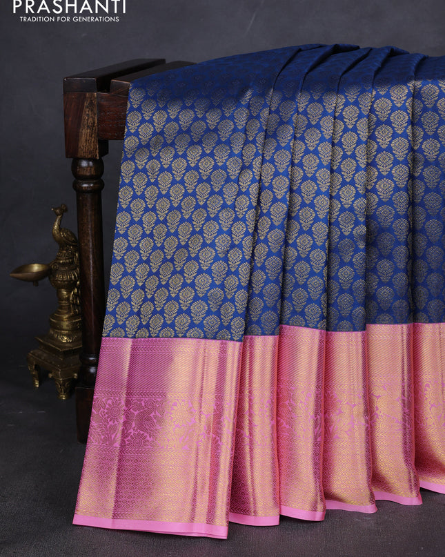 Pure kanchipuram silk saree peacock blue and peach pink with allover zari woven butta weaves and zari woven border