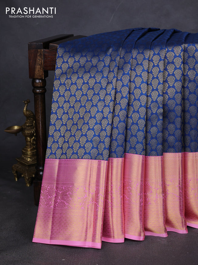Pure kanchipuram silk saree peacock blue and peach pink with allover zari woven butta weaves and zari woven border