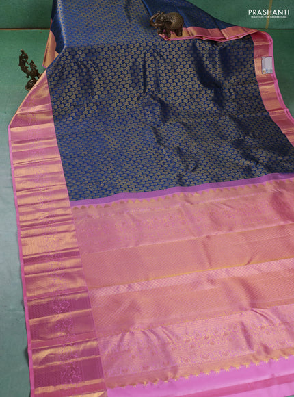 Pure kanchipuram silk saree peacock blue and peach pink with allover zari woven butta weaves and zari woven border