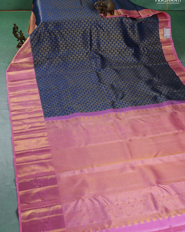 Pure kanchipuram silk saree peacock blue and peach pink with allover zari woven butta weaves and zari woven border
