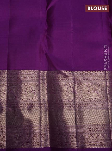 Pure kanchipuram silk saree yellow and purple with allover zari woven brocade weaves and zari woven border