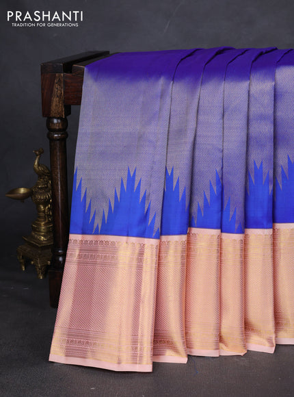 Pure kanchipuram silk saree royal blue and pale orange with allover zari weaves and zari woven korvai border