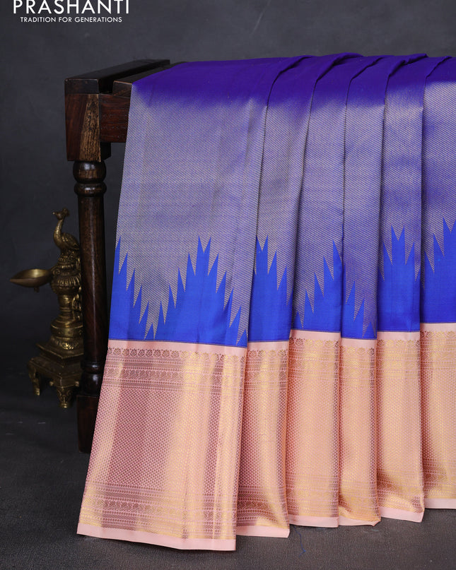 Pure kanchipuram silk saree royal blue and pale orange with allover zari weaves and zari woven korvai border
