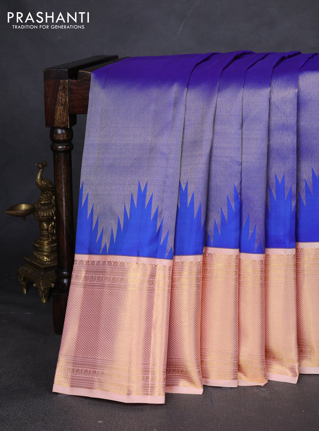 Pure kanchipuram silk saree royal blue and pale orange with allover zari weaves and zari woven korvai border