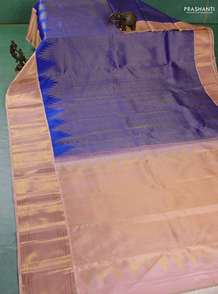 Pure kanchipuram silk saree royal blue and pale orange with allover zari weaves and zari woven korvai border