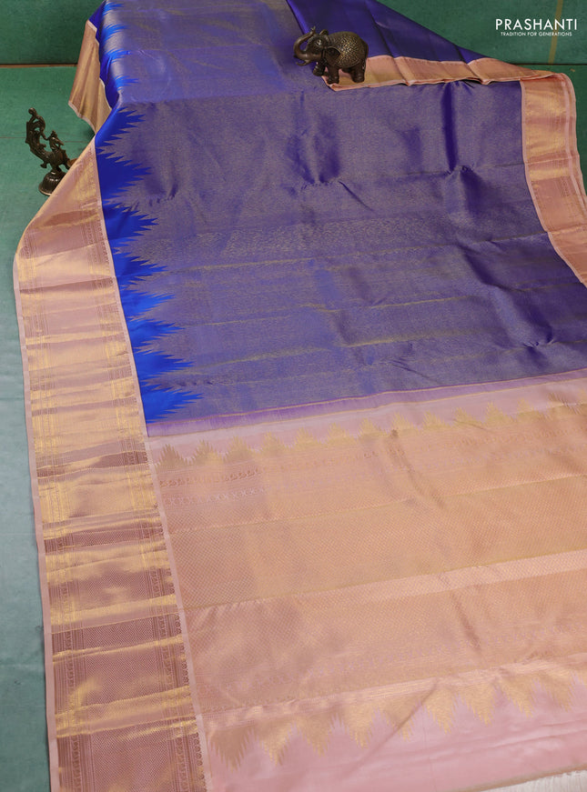 Pure kanchipuram silk saree royal blue and pale orange with allover zari weaves and zari woven korvai border