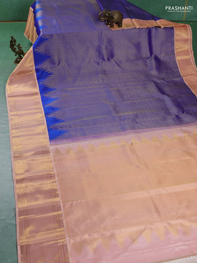 Pure kanchipuram silk saree royal blue and pale orange with allover zari weaves and zari woven korvai border