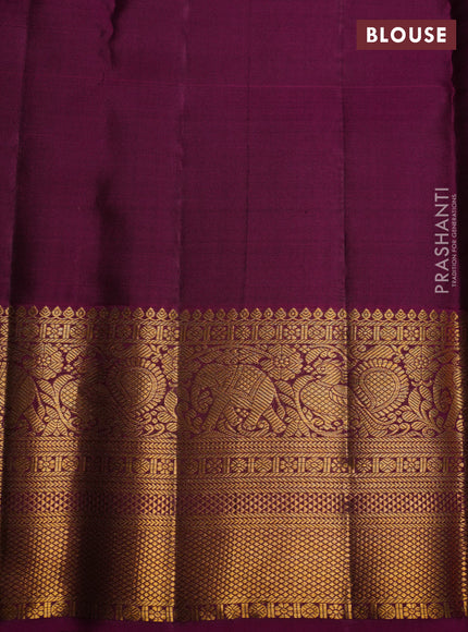 Pure kanchipuram silk saree dark green and magenta pink with allover zari checked pattern and zari woven border