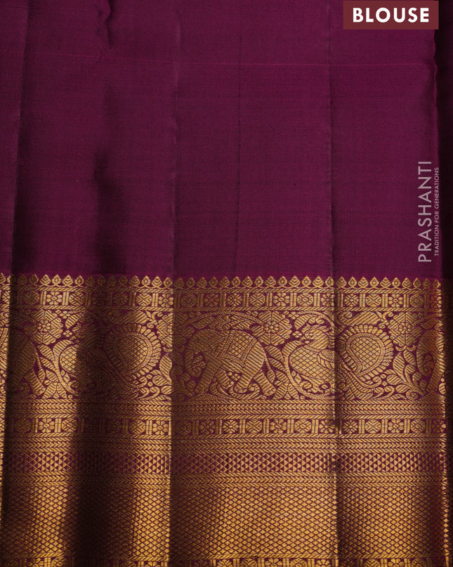Pure kanchipuram silk saree dark green and magenta pink with allover zari checked pattern and zari woven border