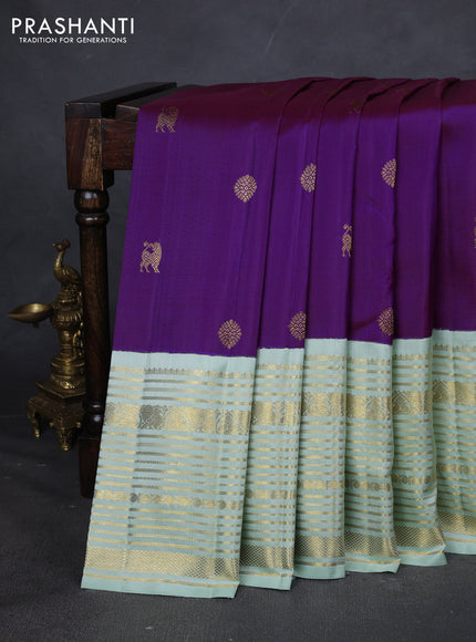 Pure kanchipuram silk saree purple and pastel green with zari woven buttas and long zari woven border