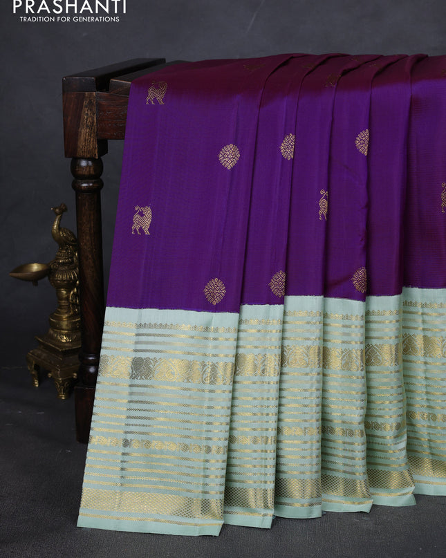 Pure kanchipuram silk saree purple and pastel green with zari woven buttas and long zari woven border
