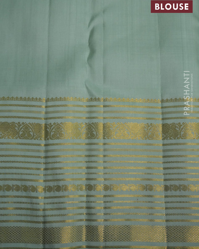 Pure kanchipuram silk saree purple and pastel green with zari woven buttas and long zari woven border