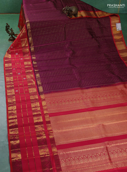 Pure kanchipuram silk saree purple and dual shade of pinkish orange with allover zari checked pattern and long zari woven border