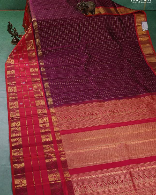 Pure kanchipuram silk saree purple and dual shade of pinkish orange with allover zari checked pattern and long zari woven border